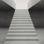 Integrating Objectives and Key Results with Portfolio Management White staircase ascending into an opening.