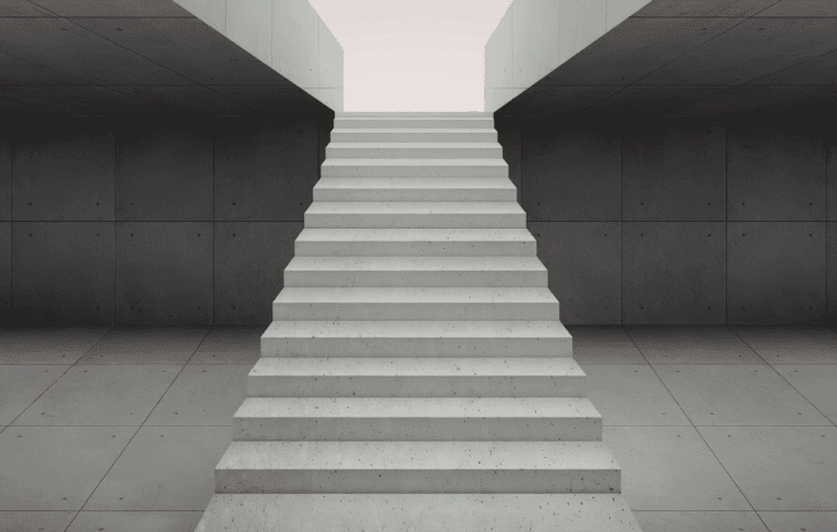 White staircase ascending into an opening.