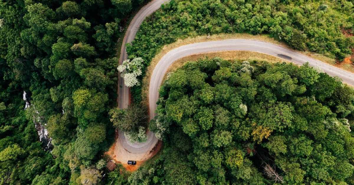 A road taking a sharp turn on a mountain represents the turn agile has taken to make way for adaptability. 